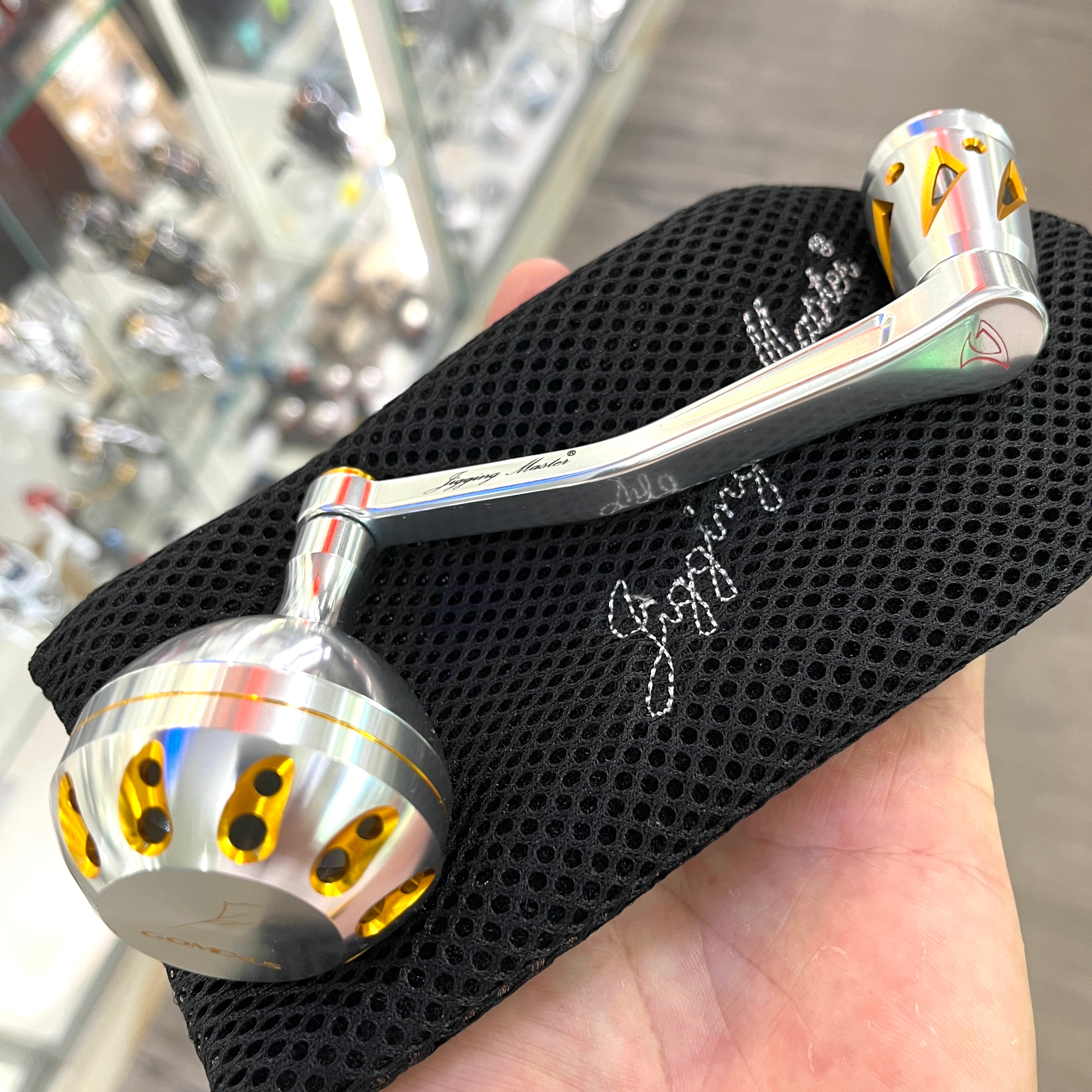 Jigging Master Power Arm NS113 Silver Gold with Gomexus 47mm Knob